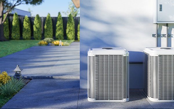 two clean and new hvac units in yard