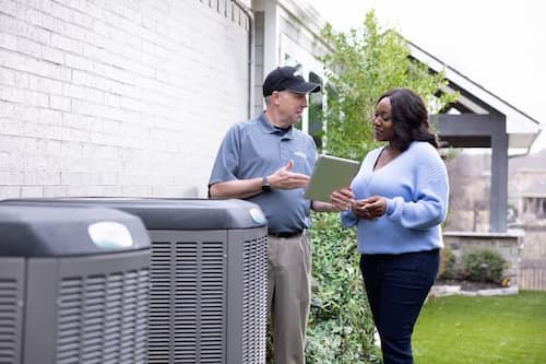 AC Unit being Discussed with Homeowner