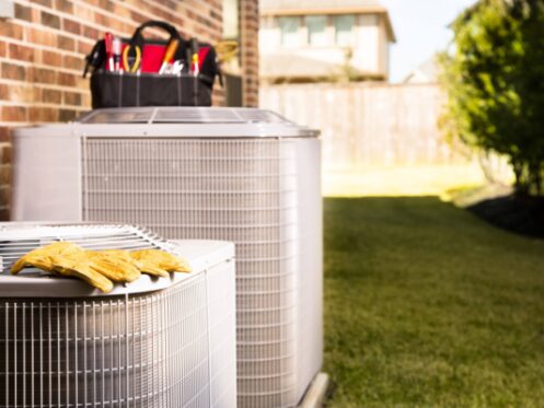 HVAC Tools on HVAC Systems Outside of Home after AC Maintenance in Washington, MO